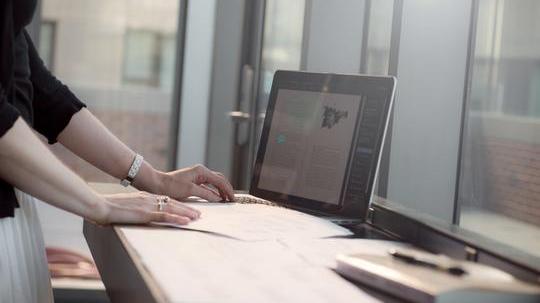 student at a laptop computer